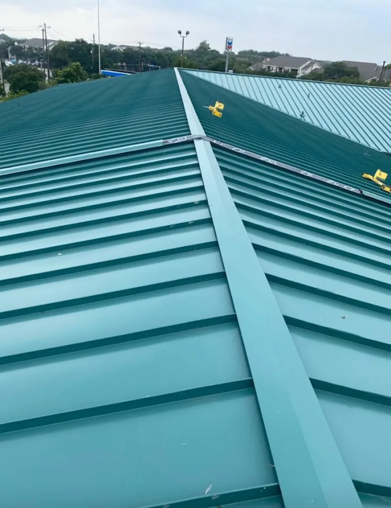 Green commercial metal roof ridge and valley for Metal Roof Repair in Rapid Valley