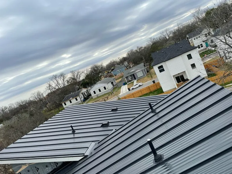 Standing seam metal roof panels with vents for Skylight Repair in Rapid Valley